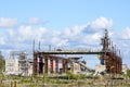 Abandoned industrial building with rusty bridge crane at scrap metal recycling metallurgical plant Royalty Free Stock Photo