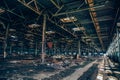 Abandoned industrial creepy warehouse inside old dark grunge factory building Royalty Free Stock Photo