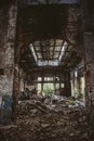 Abandoned industrial creepy warehouse inside old dark grunge factory building Royalty Free Stock Photo