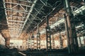 Abandoned industrial creepy warehouse inside old grunge factory building toned Royalty Free Stock Photo