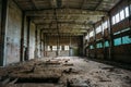 Abandoned industrial warehouse on ruined brick factory, creepy interior, perspective Royalty Free Stock Photo