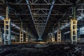 Abandoned large industrial hall with garbage waiting for demolition. Former Voronezh excavator manufacturing factory Royalty Free Stock Photo