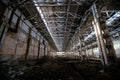Abandoned large industrial hall waiting for demolition. Former Voronezh excavator manufacturing factory Royalty Free Stock Photo