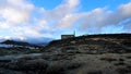 Abandoned village and church in rays of light Royalty Free Stock Photo