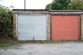Abandoned lockup-garages on a housing estate in the UK. Royalty Free Stock Photo