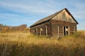 Abandoned log house on a hiilside Royalty Free Stock Photo