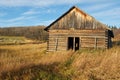 Abandoned log house on a hiilside Royalty Free Stock Photo