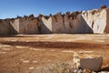 Abandoned marble quarry in the sunny day Royalty Free Stock Photo