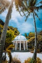 Abandoned Matinloc Shrine between two palm trees at the western coast of Matinloc Island at Palawan, Philippines Royalty Free Stock Photo