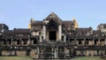 An abandoned medieval Khmer edifice in Angkor, Cambodia tells a tale of the city\'s rich yet lost grandeur Royalty Free Stock Photo