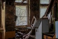 Abandoned, messy, old. creepy, ruined room with windows covered in the building located in the Chernobyl ghost town