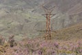 Abandoned metal tower structure in mountain landscape of Asturias Spain on a bright day