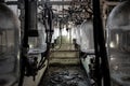 Abandoned milking machinery in an old milking parlour. Royalty Free Stock Photo