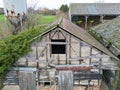 Abandoned milking parlour seen on an old dairy farm. Royalty Free Stock Photo