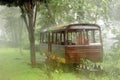 abandoned mini train on heavy rain