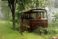 abandoned mini train on heavy rain