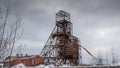 Abandoned mining facility in a winter landscape