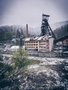 Abandoned mining facility in winter time (heavy snowing) Royalty Free Stock Photo