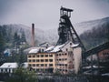 Abandoned mining facility in winter time (heavy snowing) Royalty Free Stock Photo