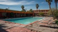 Abandoned motel with empty swimming pool and vintage architecture