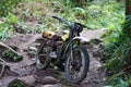 Abandoned motorcycle in forest Royalty Free Stock Photo