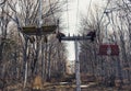 abandoned mountain Ski Lift in the forest with wood chairs