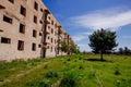 Abandoned multistory house. Consequence of war, disaster, poverty, ghost town, etc Royalty Free Stock Photo