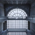 Abandoned office with large arched window