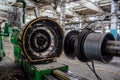 Abandoned old auto tire factory with rusted machine tools. Abandoned tire manufacturing
