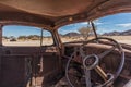 Abandoned old car interior in Namibia desert. place known as solitaire. Royalty Free Stock Photo