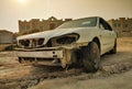 Abandoned Old Car rusting away in the desert Royalty Free Stock Photo