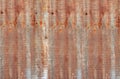 Abandoned old corrugated aluminum sheet with brown rustic texture for background