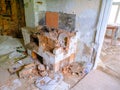 Abandoned old country house - interior of an old country house with a kitchen. A collapsed country oven Royalty Free Stock Photo