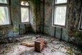 Abandoned, old. creepy, ruined room with windows covered in the building located in the Chernobyl ghost town