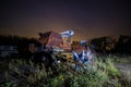 Abandoned old harvester at night Royalty Free Stock Photo