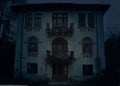 Abandoned old haunted house with dark horror atmosphere in the moonlight Royalty Free Stock Photo