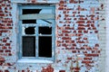 Abandoned old house. Aged brick walls. Broken window Royalty Free Stock Photo