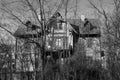 Abandoned old house in a park. Scary view.