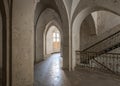Abandoned old monastery with pillars and arches