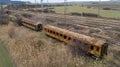 Abandoned old railway wagons at station. Old train wagons