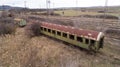 Abandoned old railway wagons at station. Old train wagons