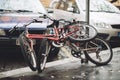 Abandoned old rusty bicycles on city streets