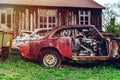 Abandoned old rusty body and parts of retro car Royalty Free Stock Photo