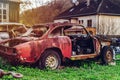 Abandoned old rusty body and parts of retro car Royalty Free Stock Photo