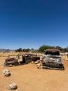 Abandoned old rusty car. Body of a retro car in the sands. Desert in Namibia. Royalty Free Stock Photo