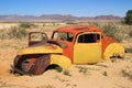 Abandoned old rusty cars in the desert of Namibia and near the Namib-Naukluft National Park Royalty Free Stock Photo