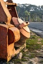 Abandoned Old Rusty Cement Mixer Machine beside the road Royalty Free Stock Photo