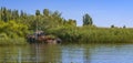 Abandoned old rusty fishing boat on shore Royalty Free Stock Photo