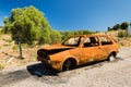 Abandoned old rusty wreck of a car