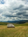 Abandoned old shepherd cottage on pasture land Royalty Free Stock Photo